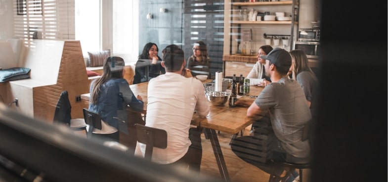 Team collaboration in a modern office meeting room.